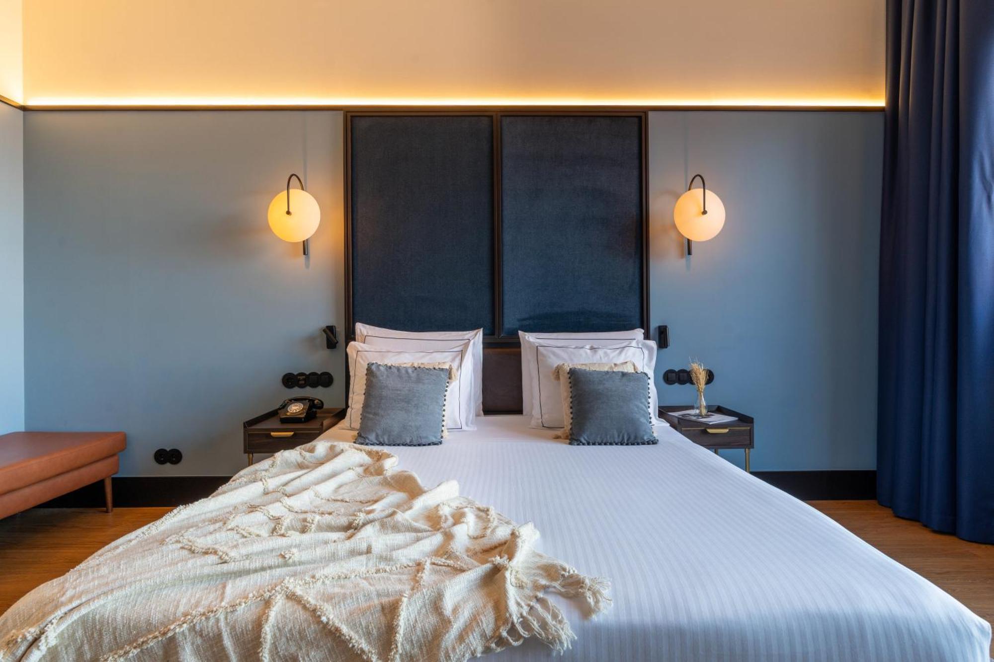 The Editory Riverside Hotel, An Historic Hotel Lisbon Luaran gambar A bedroom at the hotel